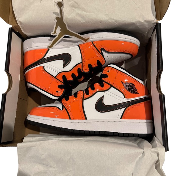 jordans black and white shiny